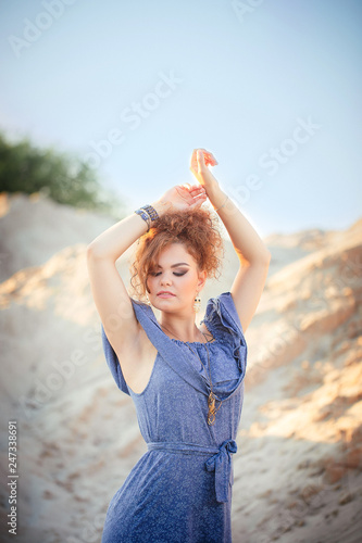 beautiful woman posing in the desert