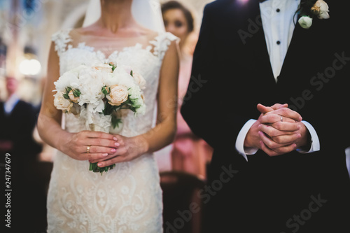Wedding couple bide and groom get married in a church