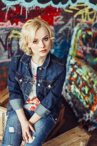 Close up portrait of art creative talanted person. Young blondie woman, smiling, looking at camera in studio