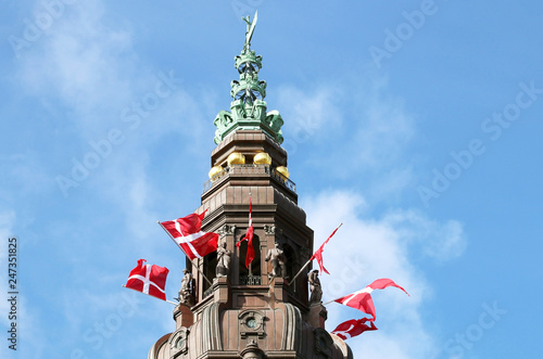 The danish flags on the tower. Christiansborg Palace, Copenhagen, Denmark. photo