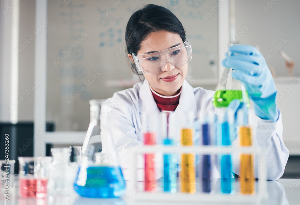 Scientist hand holding a Test tubes. Scientist hand holding a Test tubes.
