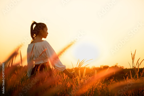 Beautiful Young Woman in a field  © max_play
