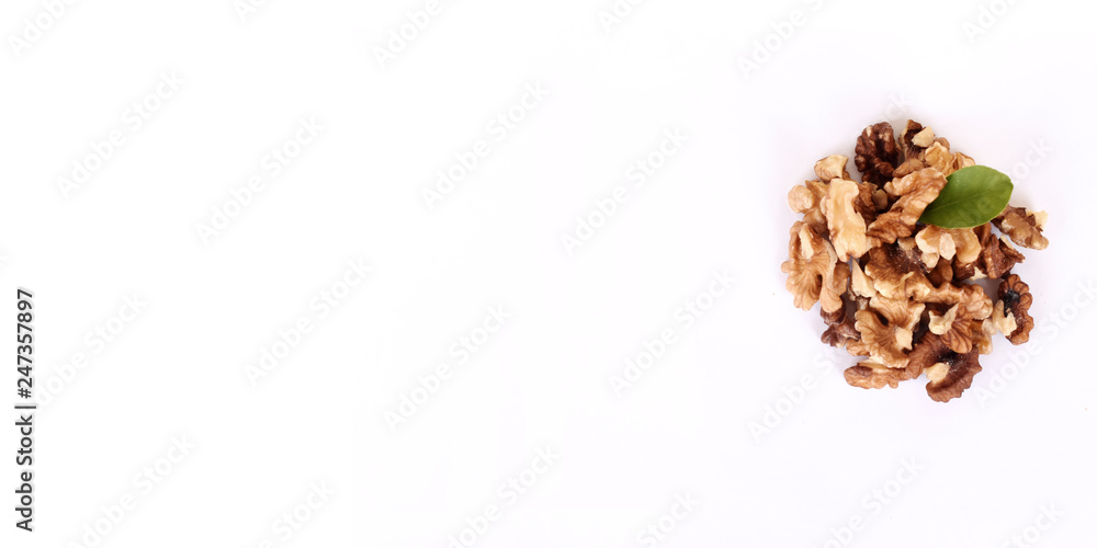 Nuts with a leaf on a white background. Nuts with a leaf on a white background.