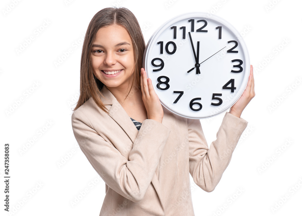 Portrait of beautiful Teen Girl holding big Alarm Clock, isolated on white background. Child Back to School, Educational and Time Concept. Time is running out. Portrait of beautiful Teen Girl holding big Alarm Clock, isolated on white background. Child Back to School, Educational and Time Concept. Time is running out.