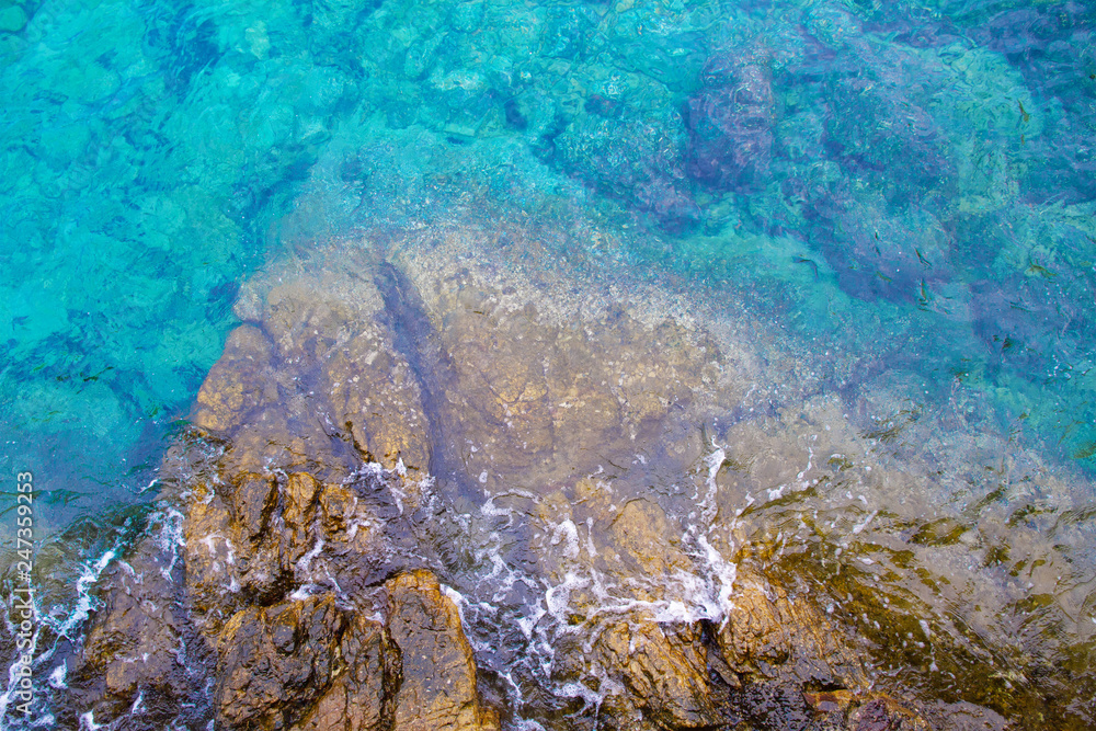 Obraz premium Beach summer blue sea wave seaside beautiful ocean with stone 