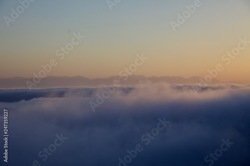Above the clouds in the mountains