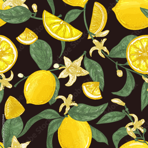 Natural seamless pattern with fresh juicy lemons, whole and cut into pieces, branches with blooming flowers and leaves on black background