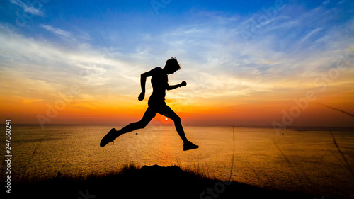 Men are running for good health at sunset.