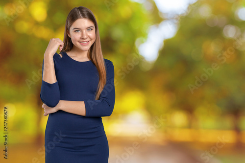 Portrait of confident young woman standing