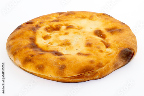 Caucasian unleavened white bread made from wheat flour - pita bread