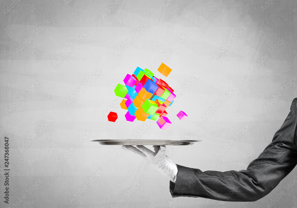 Hand of waiter presenting cubes on tray. Hand of waiter presenting cubes on tray.