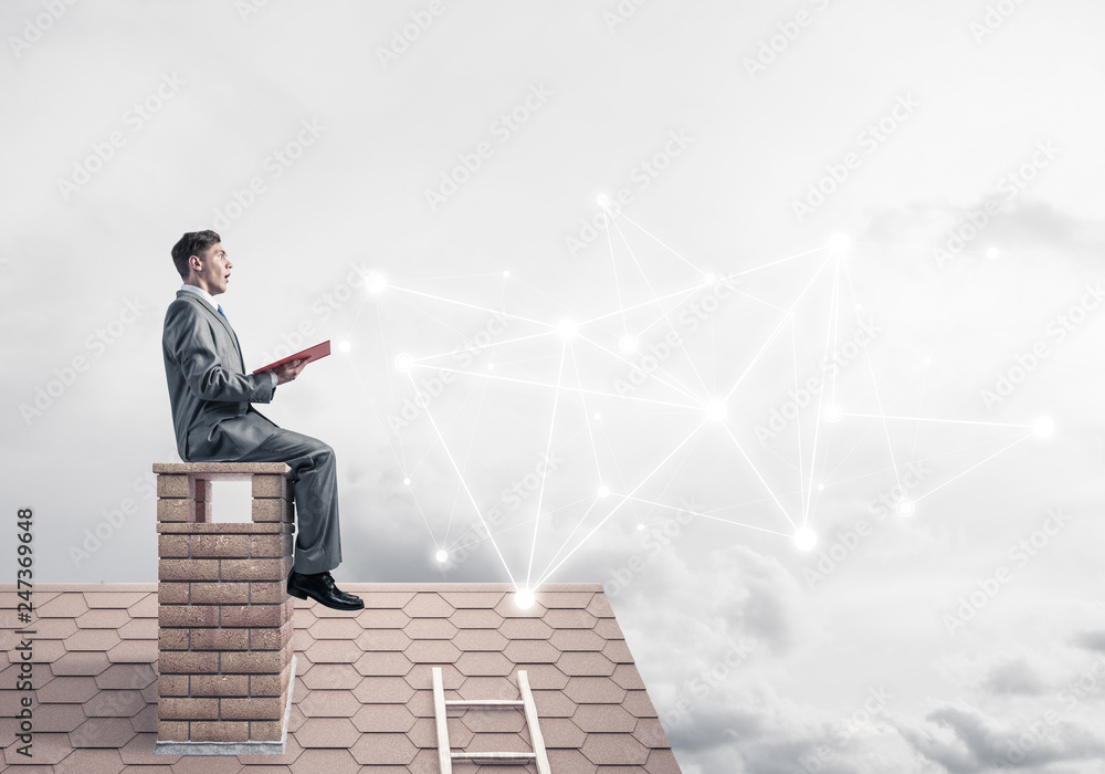 Man reading book and concept of social connection in sky Man reading book and concept of social connection in sky