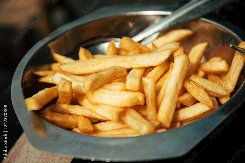 Golden French fries potatoes ready to be eaten Golden French fries potatoes ready to be eaten