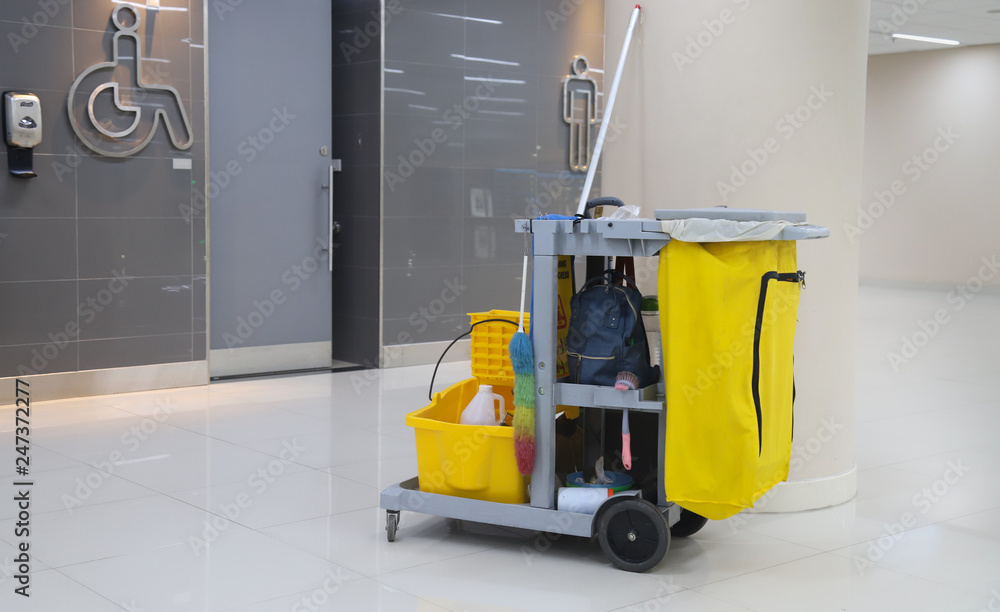 Closeup of cleaning equipment and tools, janitorial for floor cleaning.  Photos | Adobe Stock