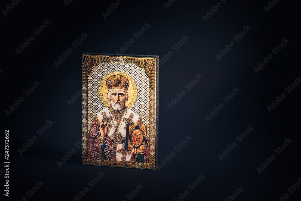 Obraz premium Orthodox icon of St. Nicholas on a black background.