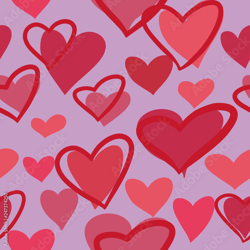 Beautiful seamless pattern with multicolored hearts on a purple background