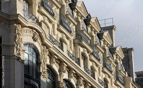 Facade of a traditional apartmemt building in Paris, France