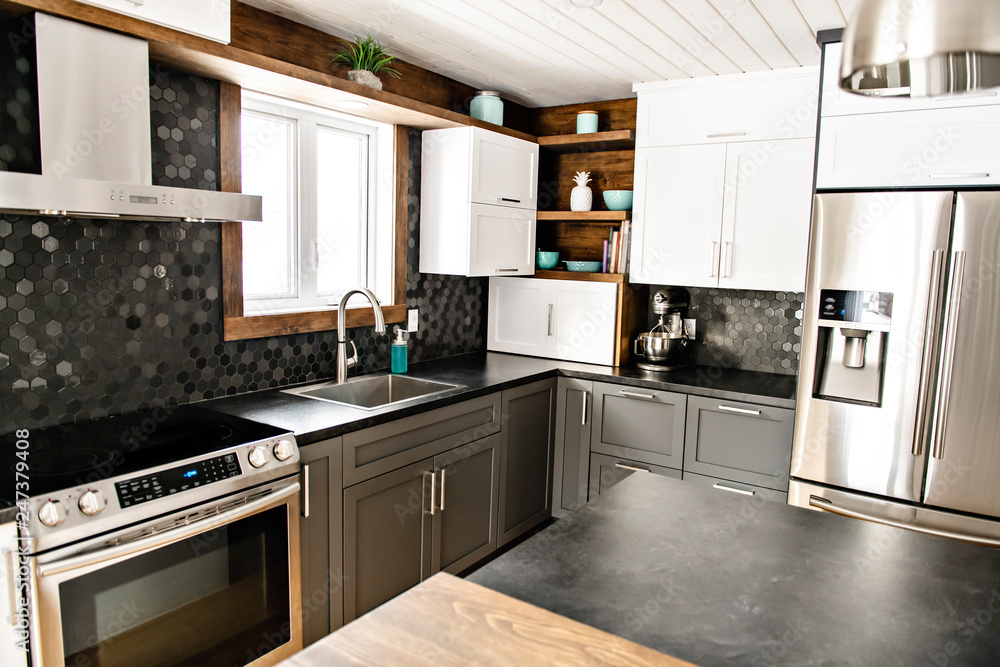 Modern gray kitchen in a beautiful house Modern gray kitchen in a beautiful house