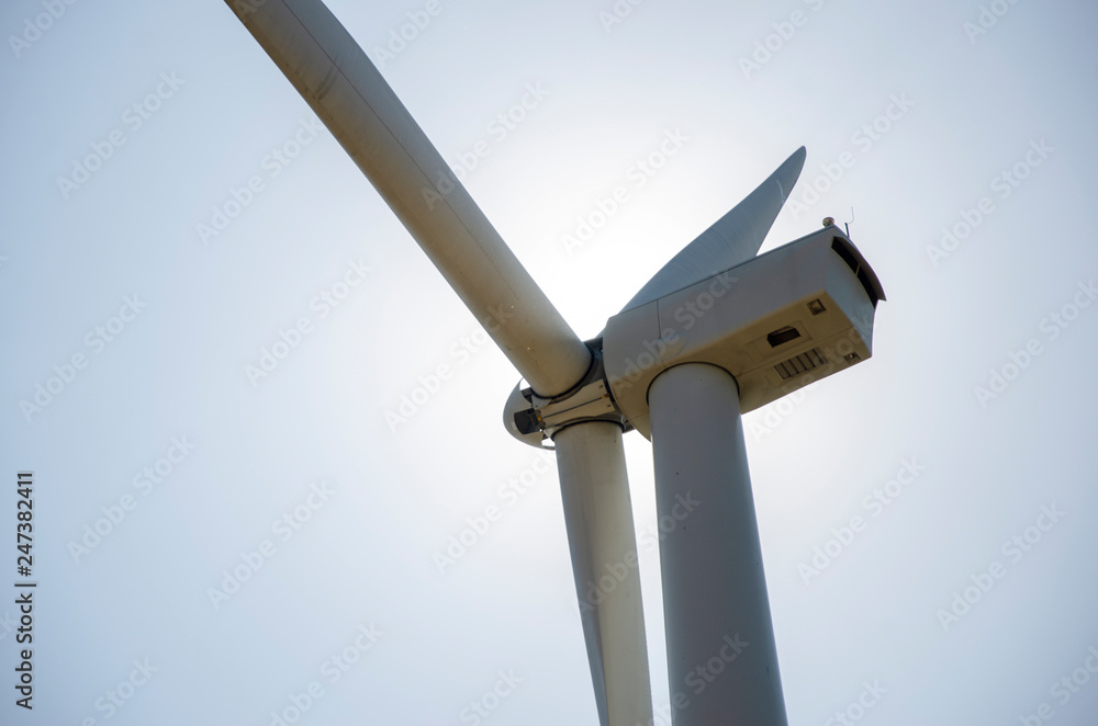 Wind turbines that produce clean energy with the sky background Wind turbines that produce clean energy with the sky background