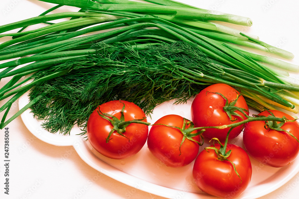 red tomato with greens red tomato with greens