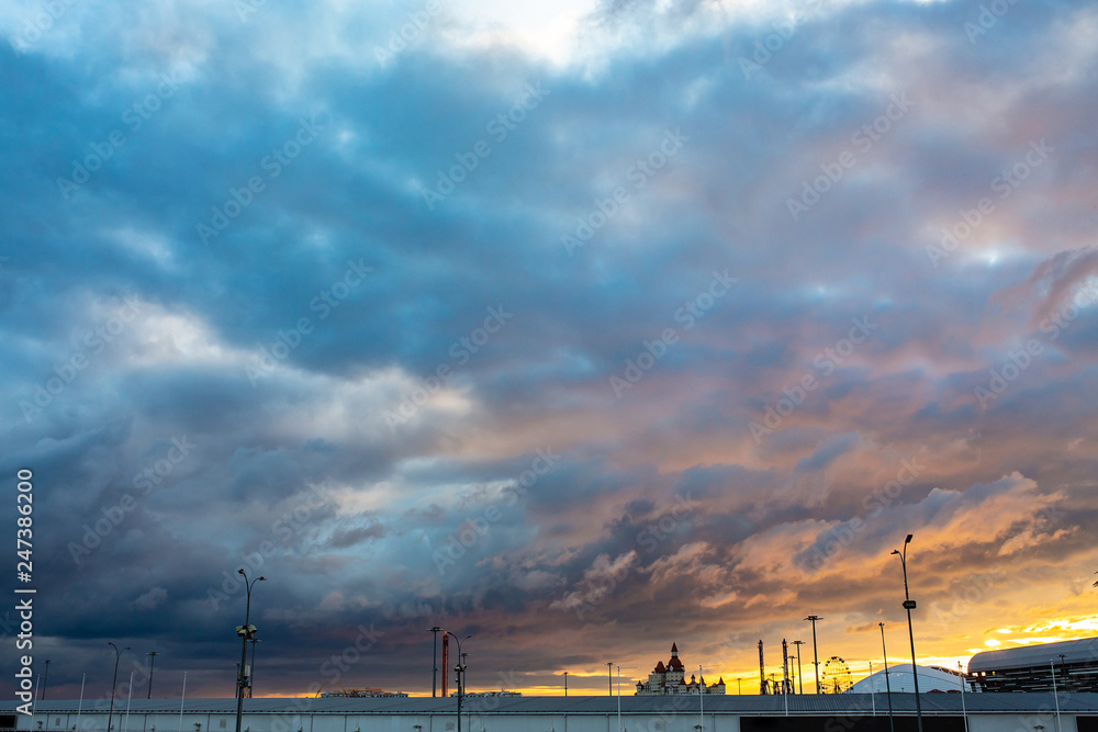 Fototapeta premium Dramatic sunset with clouds like fire in the sky