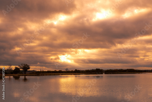 Stormy clouds over lake in New Forest countryside © Aardvark Studios