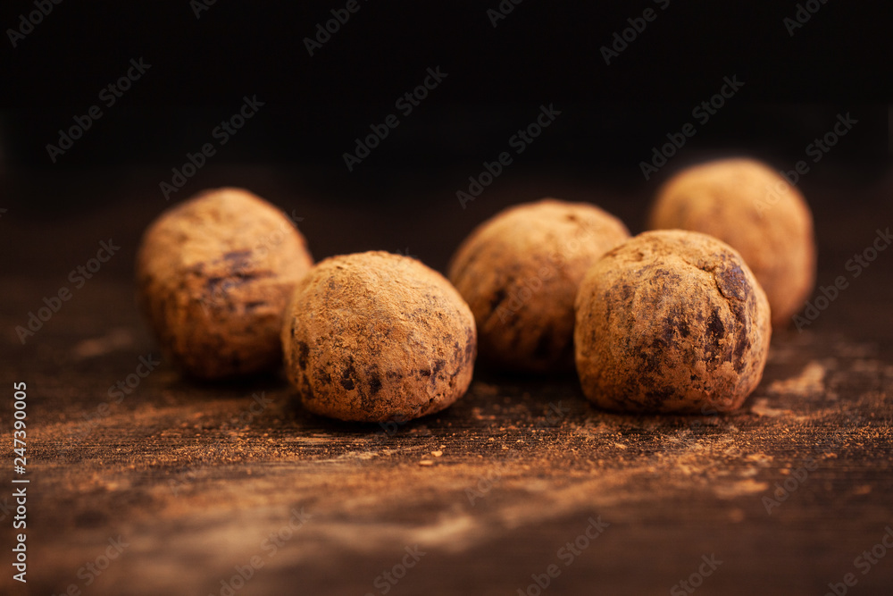 beautiful sweets on wooden dark surface close-up. beautiful sweets on wooden dark surface close-up.