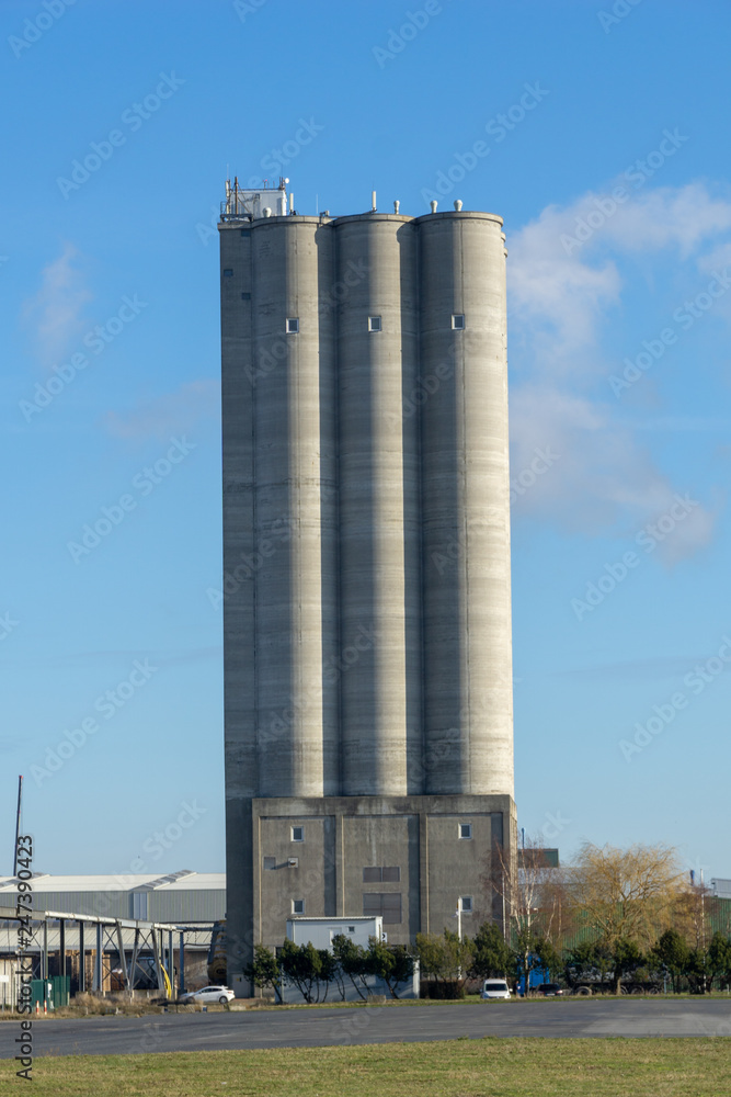 silos made of concrete and blue sky