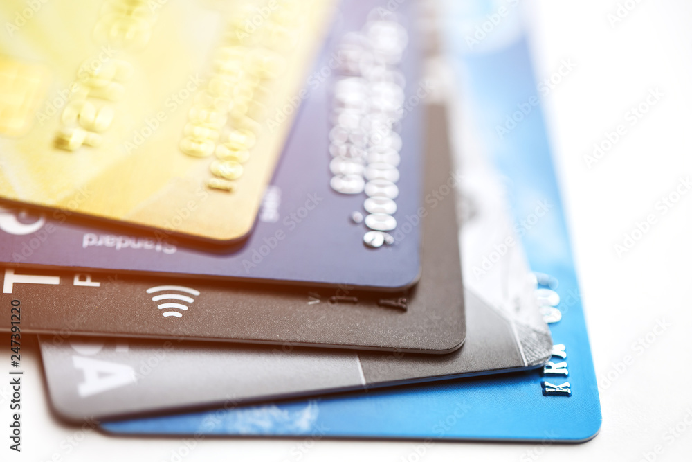 Credit card payment with close up shot isolated on white background,selective focus. Credit card payment with close up shot isolated on white background,selective focus.