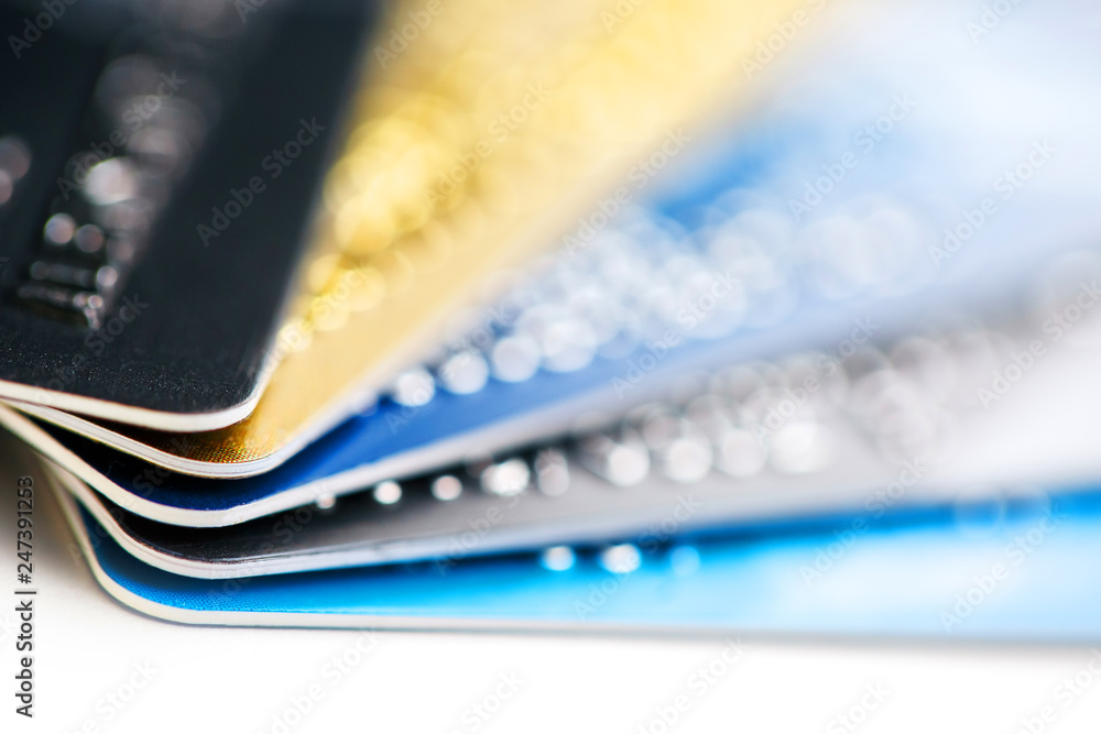 Credit card payment with close up shot isolated on white background,selective focus.