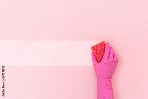 Woman holding sponge for washing in her hands