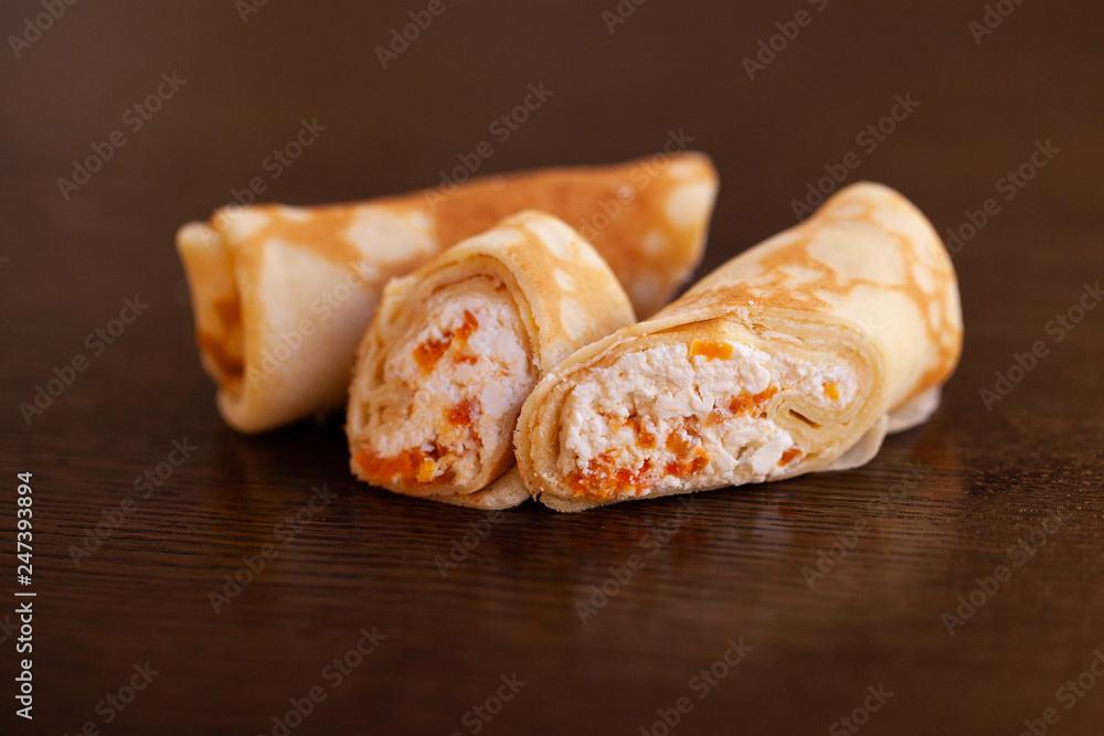 Fried Spring rolls on table in the kitchen on wooden background Fried Spring rolls on table in the kitchen on wooden background