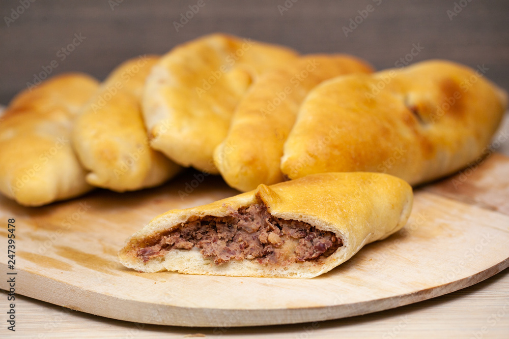 Hotcakes with fill, traditional English Georgian khachapuri Russian appetizer