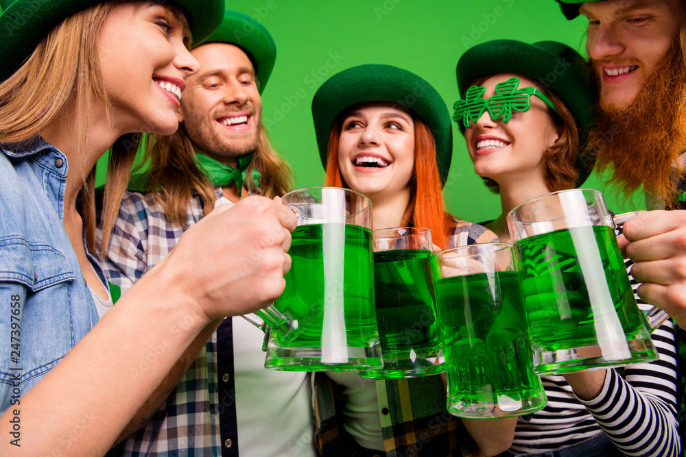 Cropped close-up low angle view of attractive cheerful positive people guys girls wearing costumes cool trendy stylish look clinking jar craft ale in pub isolated over bright  shine background