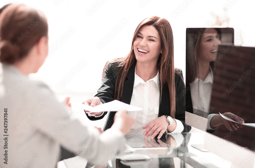 business team sitting at the Desk business team sitting at the Desk