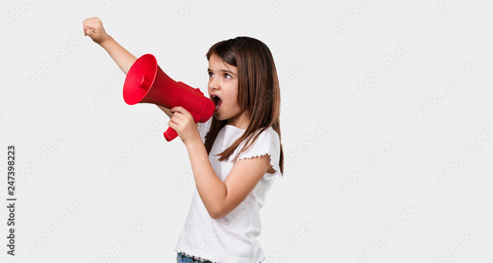 Full body little girl excited and euphoric, shouting with a megaphone, sign of revolution and change, encouraging other people to move, leader personality Full body little girl excited and euphoric, shouting with a megaphone, sign of revolution and change, encouraging other people to move, leader personality