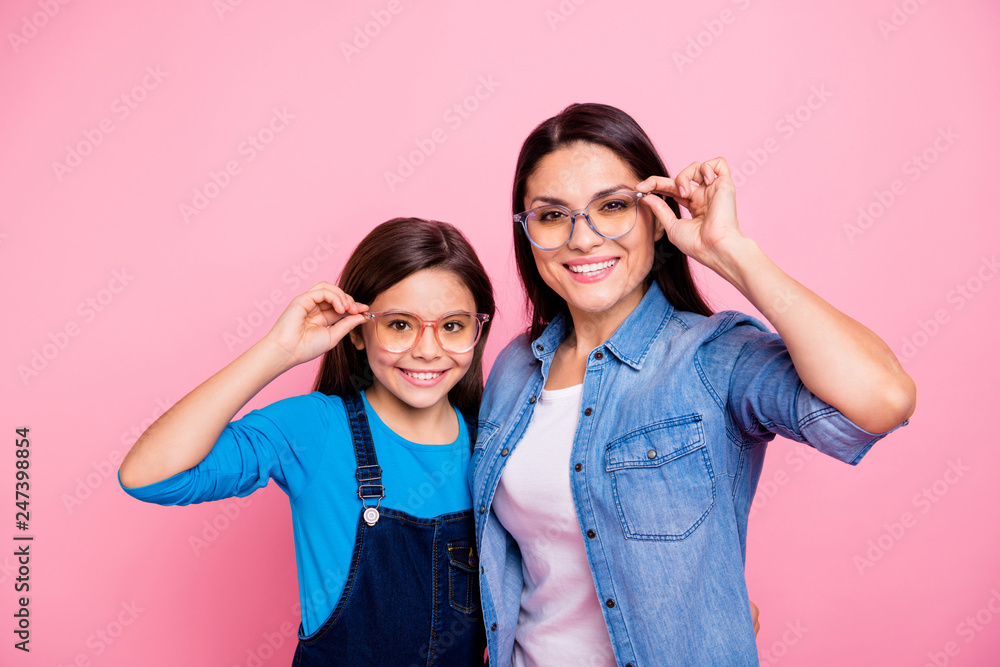 Portrait of two nice trendy cute winsome pretty lovely attractive charming cheerful cheery positive straight-haired girls touching glasses lifestyle isolated over pink pastel background Portrait of two nice trendy cute winsome pretty lovely attractive charming cheerful cheery positive straight-haired girls touching glasses lifestyle isolated over pink pastel background
