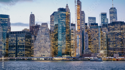 Beautiful Manhattan skyline and New York city lights in the evening
