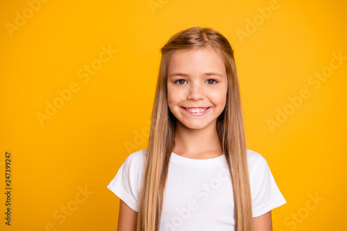 Close-up portrait of her she nice cute adorable attractive lovely pretty winsome sweet cheerful cheery straight-haired girl isolated over bright vivid shine yellow background photo