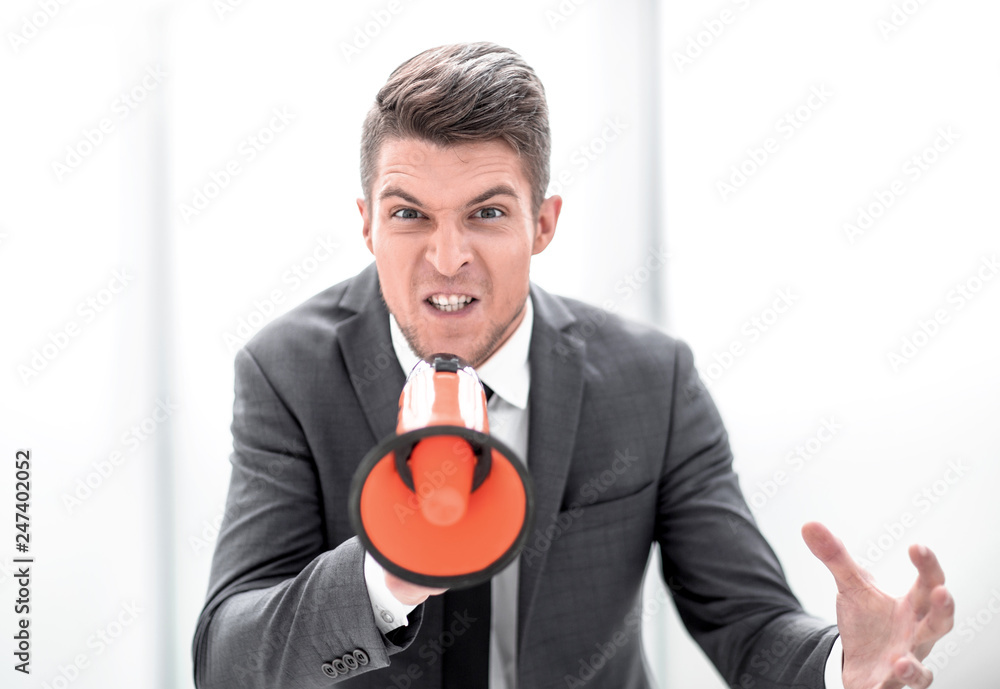portrait of young man handsome shouting using megaphone portrait of young man handsome shouting using megaphone