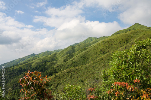 Grassy mountain tops in China photo