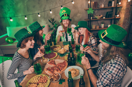 Portrait of nice stylish trendy lovely attractive cheerful glad positive group of people guys chatting craft brewery jar mug beer festive amusement having fun in pub indoors