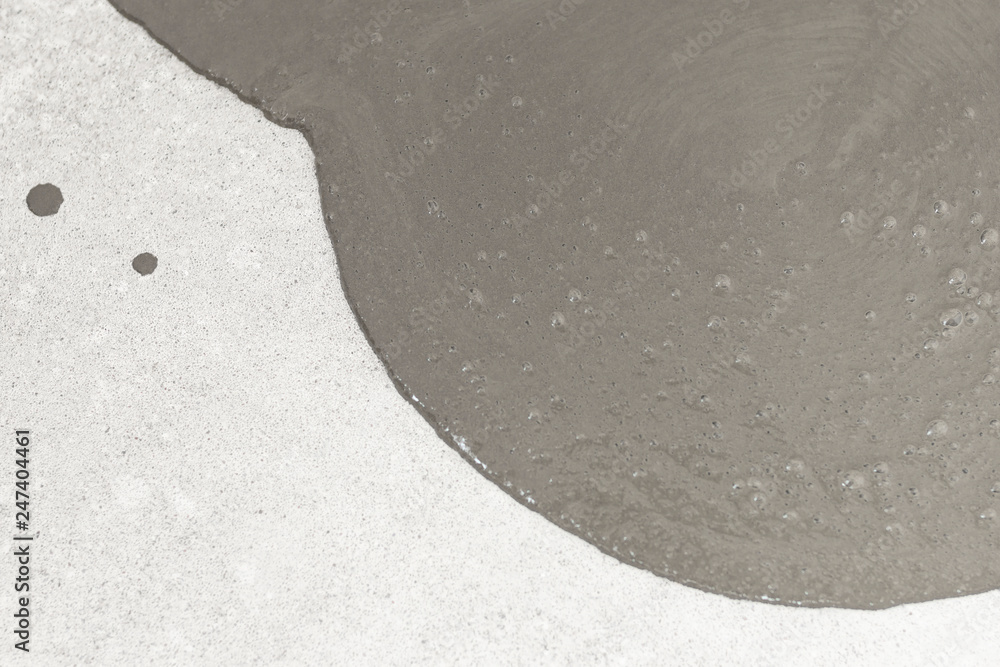 Obraz premium concrete floor. on it departure fluid to align the horizon. close-up. there is toning