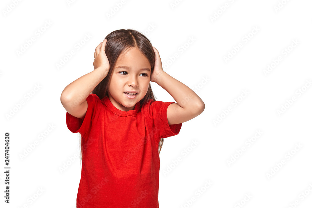 Little girl closed her ears with hands and does not want to listen anyone Little girl closed her ears with hands and does not want to listen anyone