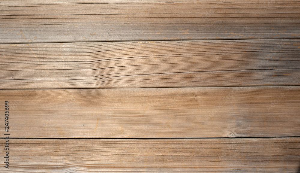 Obraz premium Light brown wooden planks, wall, table, ceiling or floor surface. Wood texture