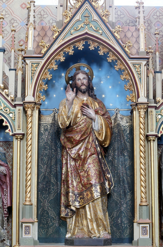 Sacred heart of Jesus statue on the Sacred heart of Jesus altar in the church of Saint Matthew in Stitar, Croatia.