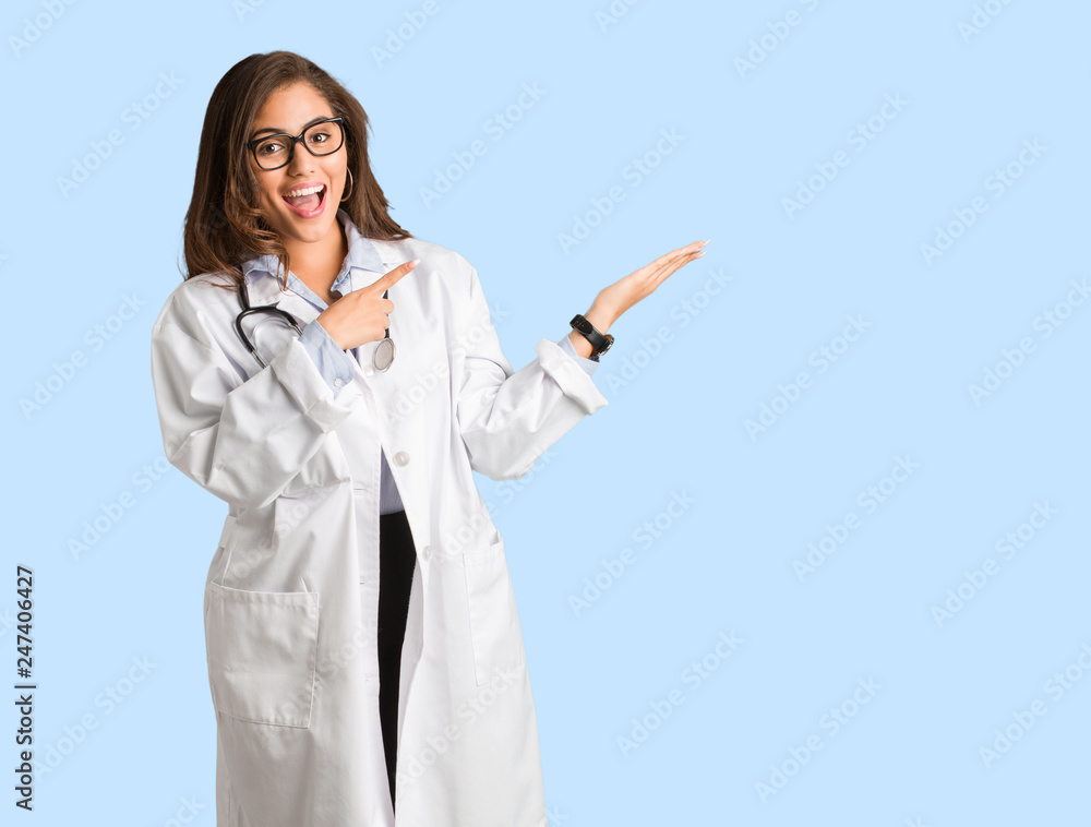 Full body young doctor woman holding something with hand Full body young doctor woman holding something with hand