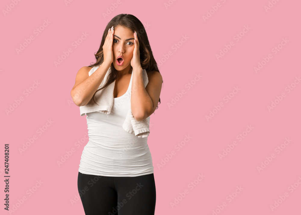 Full body young fitness curvy woman surprised and shocked Full body young fitness curvy woman surprised and shocked