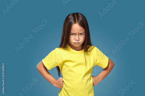 Obraz na płótnie Angry little kid showing frustration and disagreement