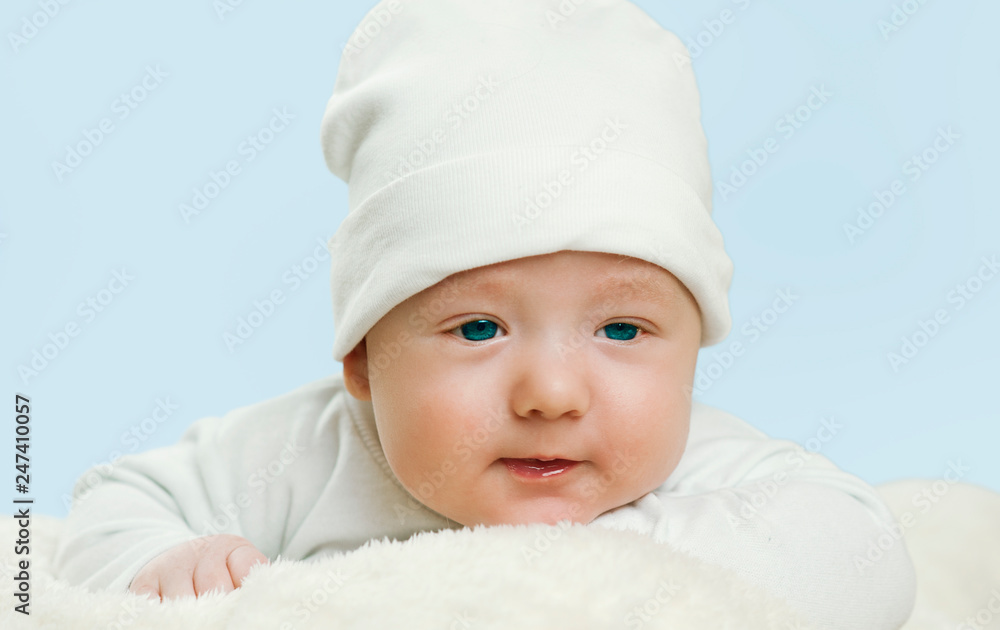 emotional newborn beautiful tender baby lies on a white blanket. The concept of health emotional newborn beautiful tender baby lies on a white blanket. The concept of health